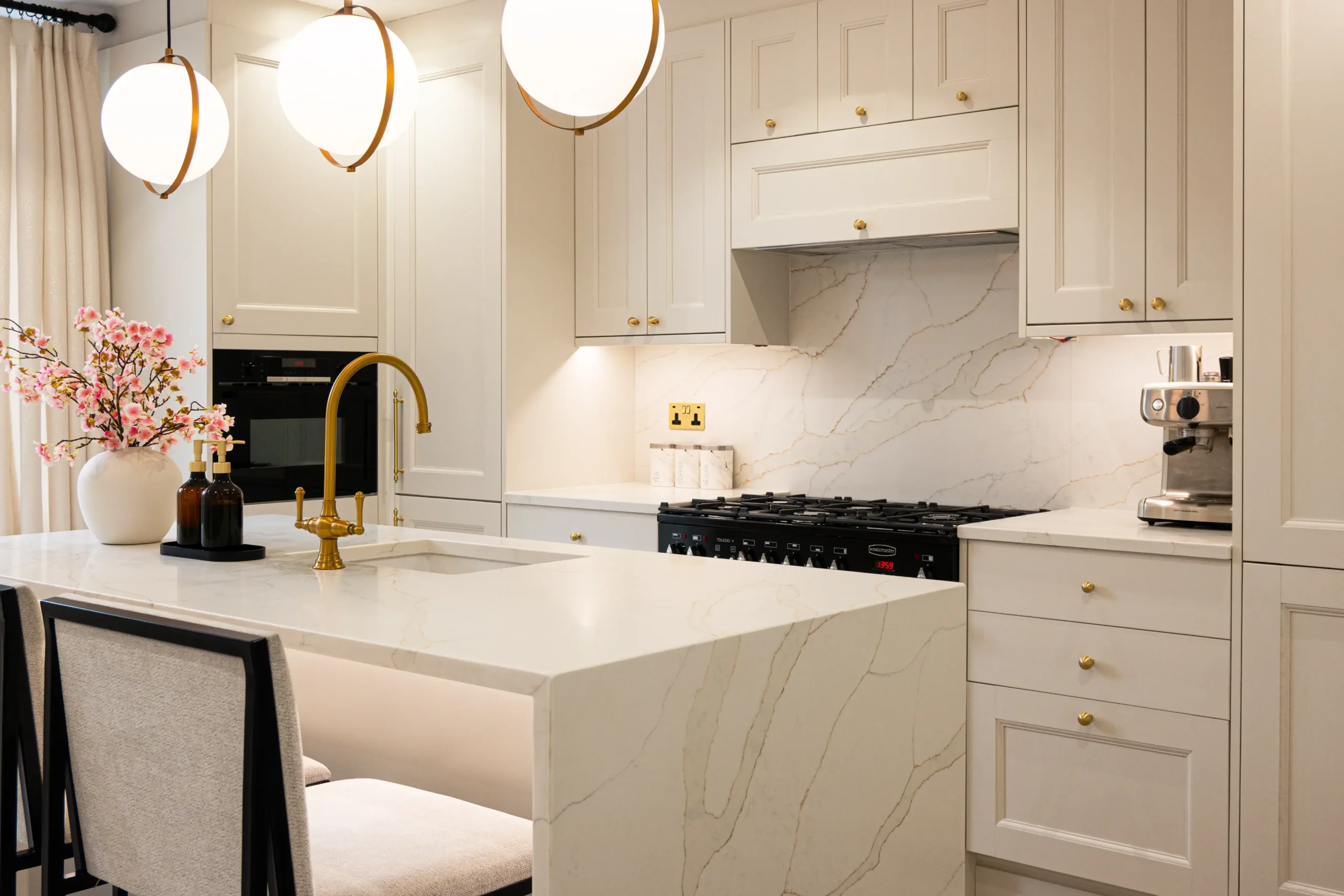 Calacatta Gold worktop showing flowing grey and subtle gold veining