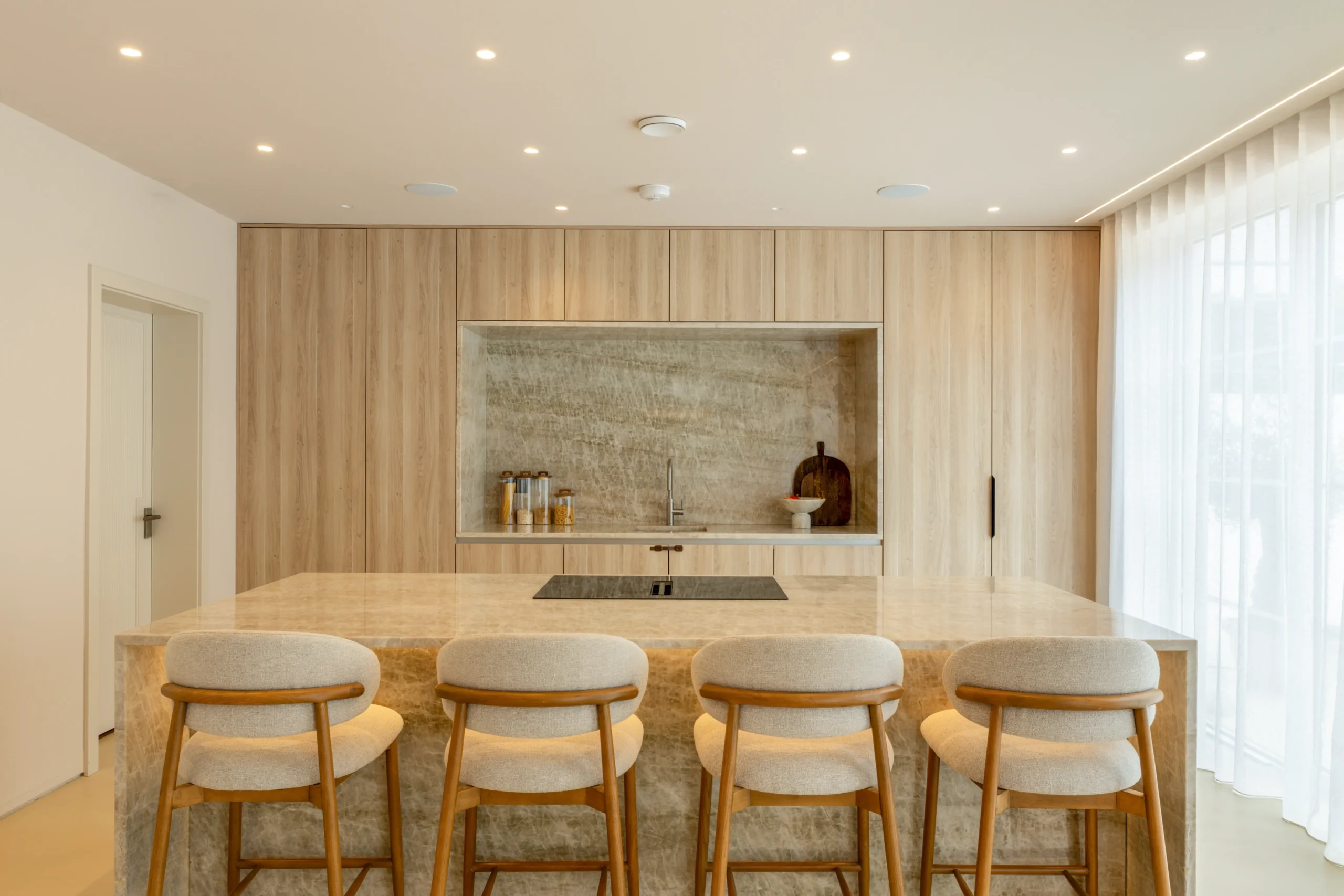 Taj Mahal Quartzite worktop showing soft beige tones and flowing veining