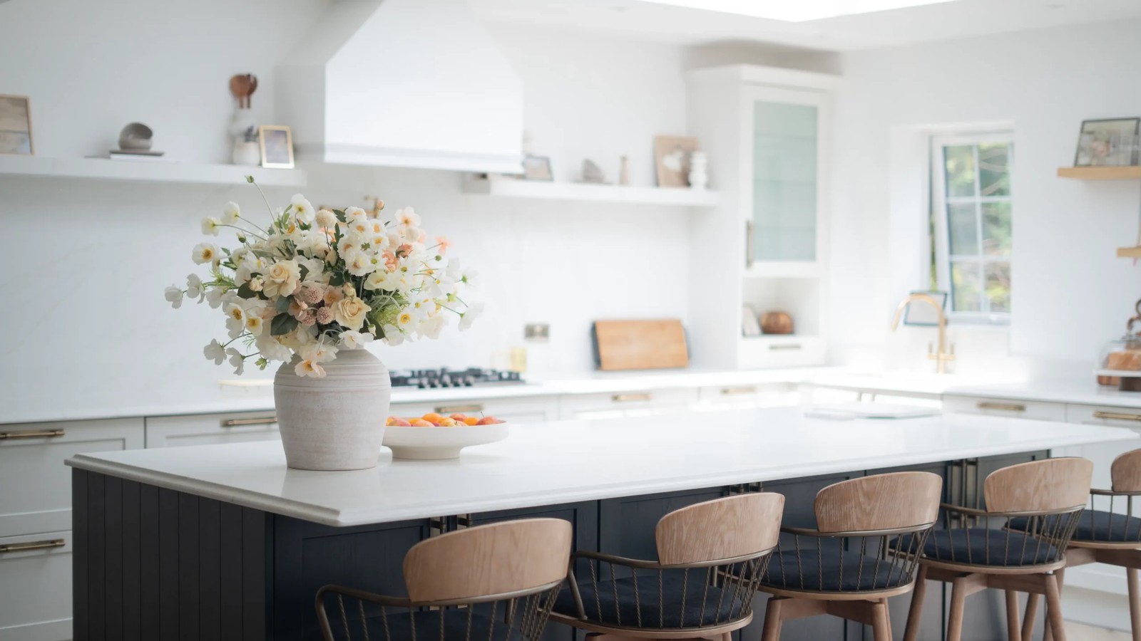 Calacatta Gold worktops with Ogee edge and bespoke shelving in Northamptonshire