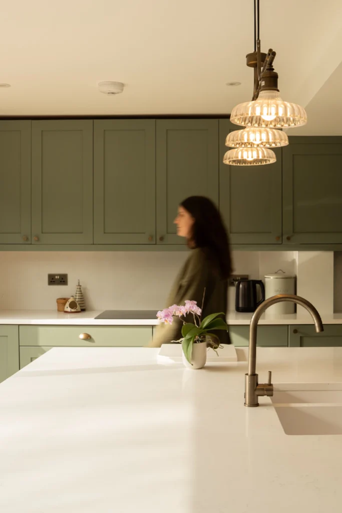 Minimal kitchen design with ELORĀ stone worktops and clean cabinetry