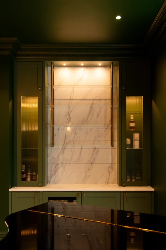 Elegant kitchen with ELORĀ marble-effect worktops and warm lighting