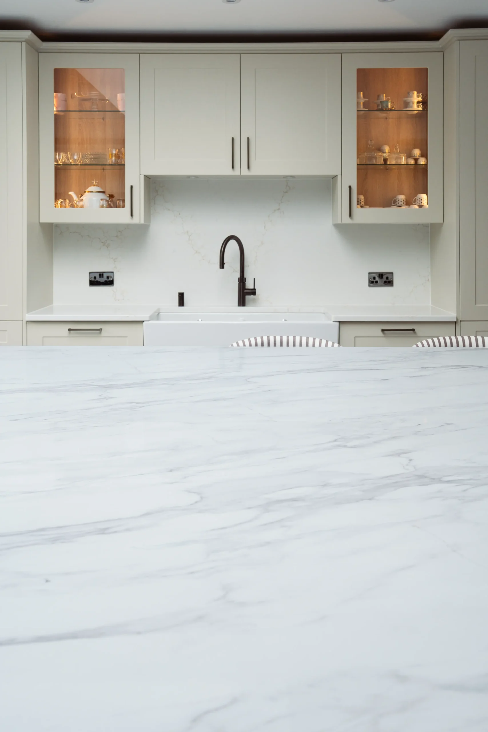 Calacatta Oro worktop surface with soft grey and subtle gold veining