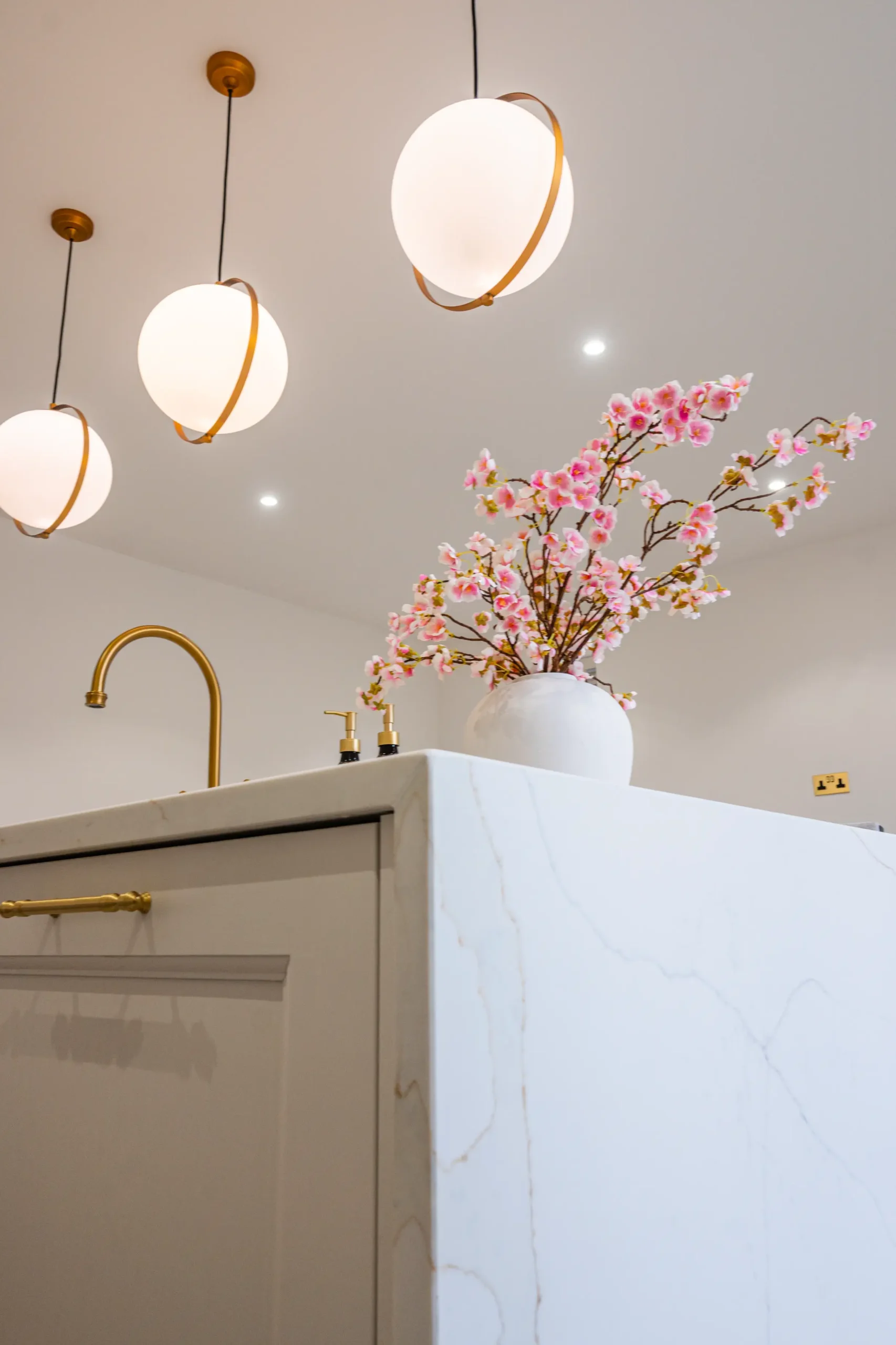 Calacatta Gold worktop with flowing grey and subtle gold veining