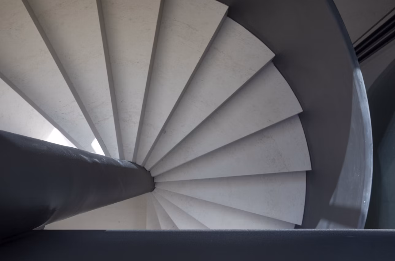 Curved staircase with Danae Dekton cladding