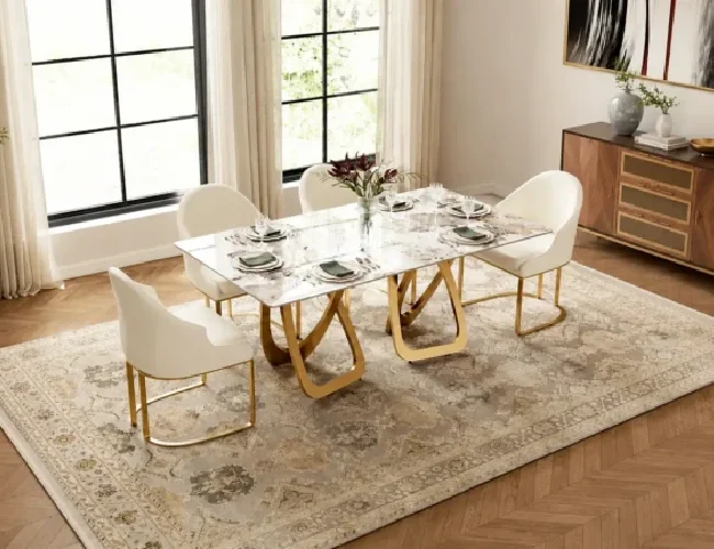Summit bespoke stone dining table with polished stone top and gold metal base