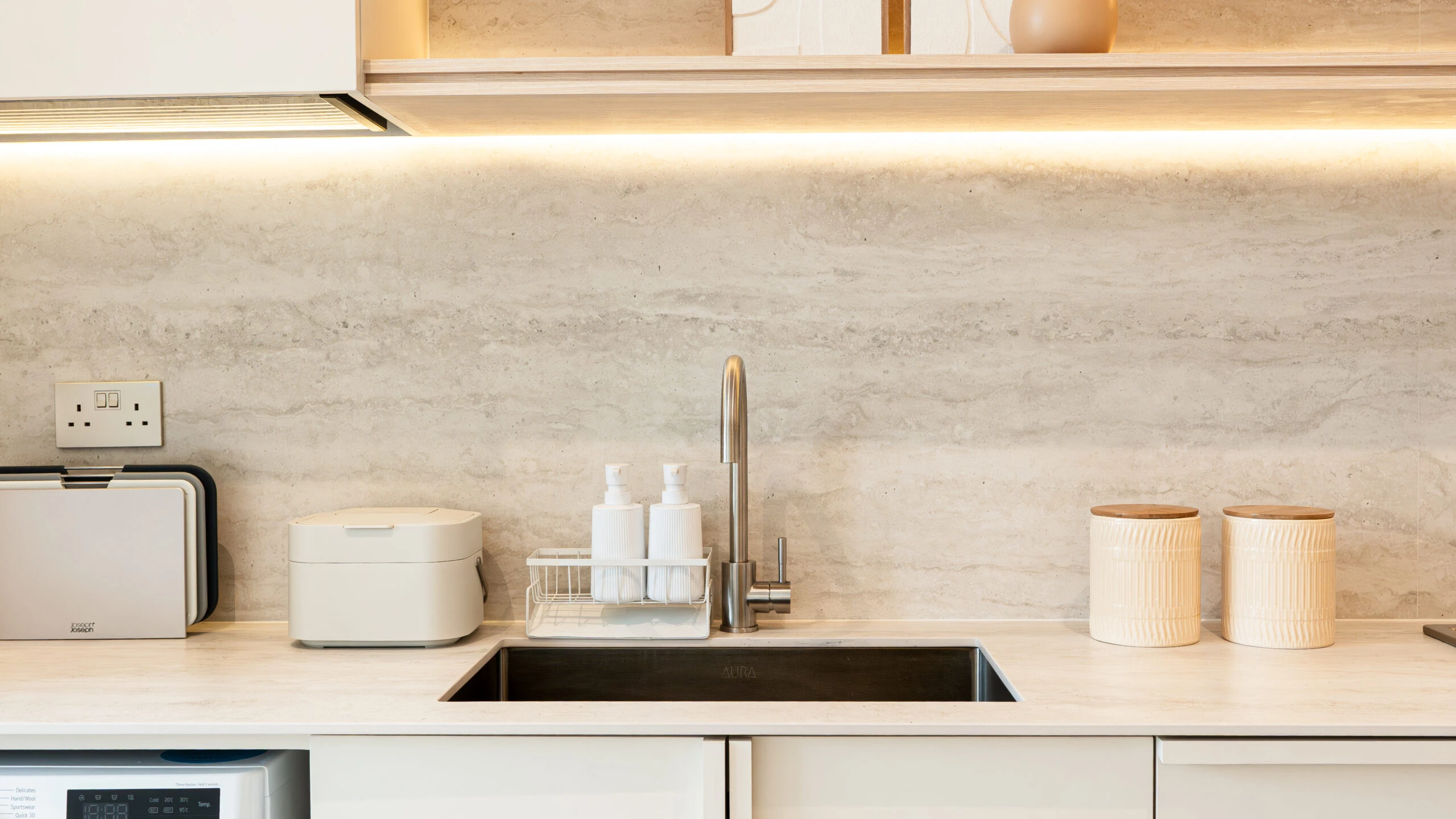 Travertine sintered stone worktop in a kitchen setting