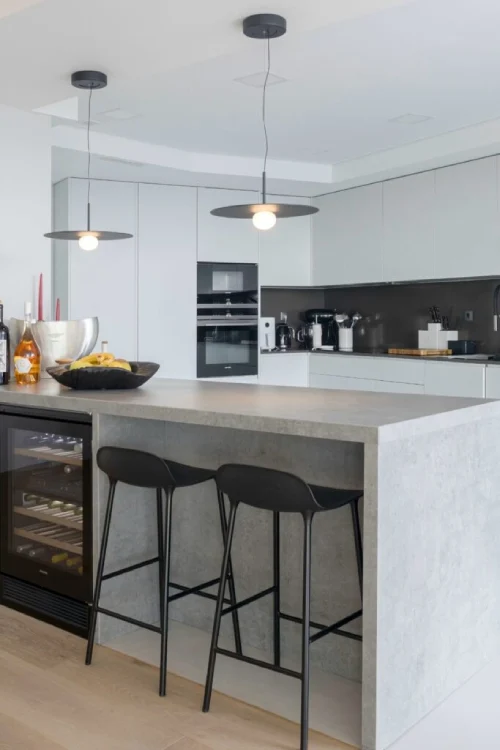Contemporary kitchen with DEKTON worktops and floor-to-ceiling glazing