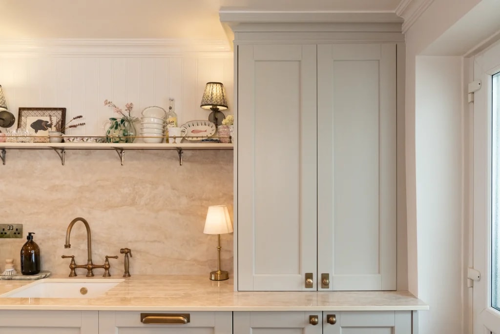 SINTERRA Crema worktop alongside light grey kitchen cabinetry