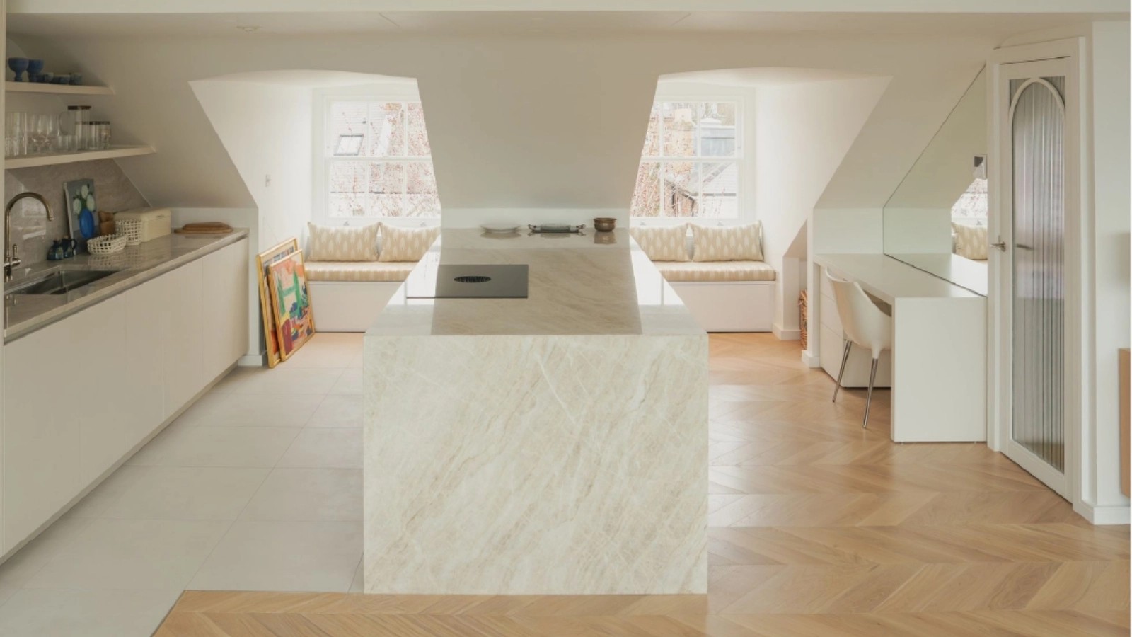 Taj Mahal quartzite wrapped kitchen island in a South West London loft kitchen