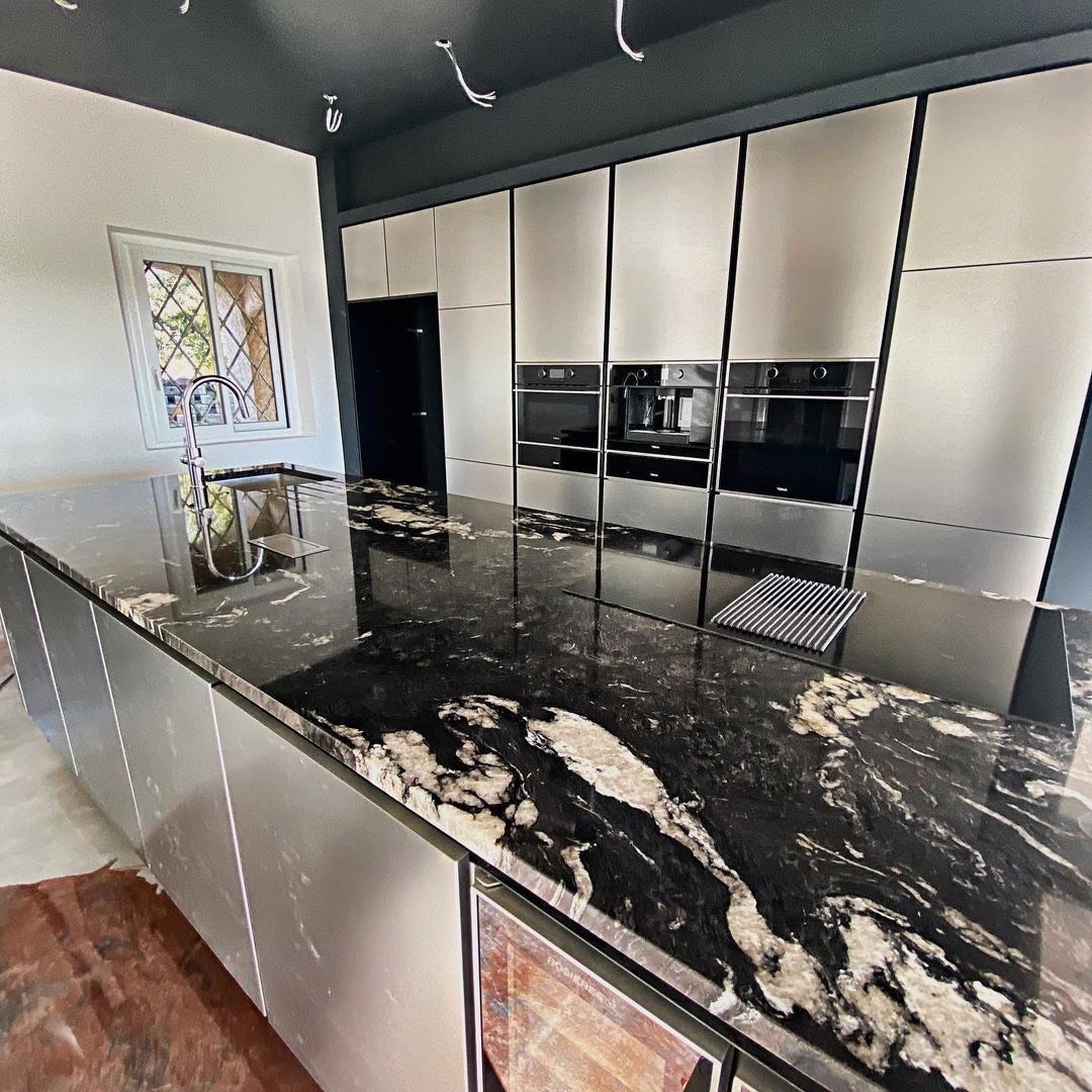 Image of black granite worktop installed in a modern kitchen