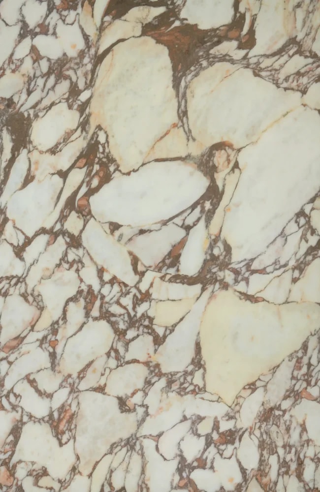 Calacatta Viola worktop with deep burgundy veining across a warm ivory base