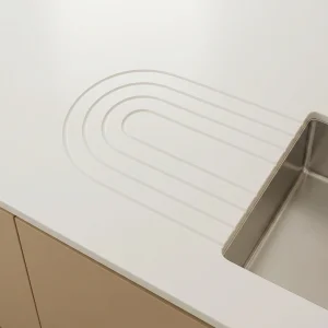 Horseshoe drainage grooves in stone worktop